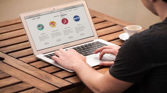 Bringing It All Home For The Holidays! Man on laptop